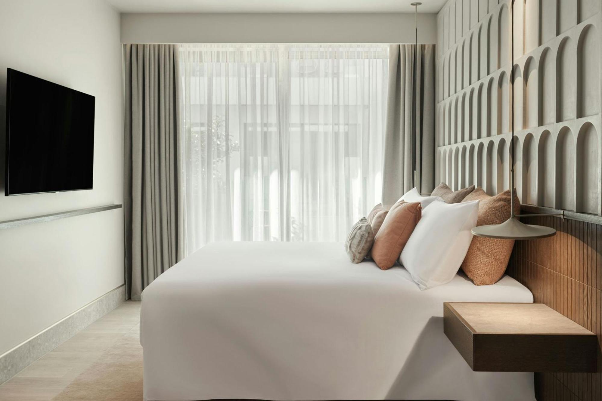 Monasty, Thessaloniki, Autograph Collection Hotel Kültér fotó A bedroom at the hotel