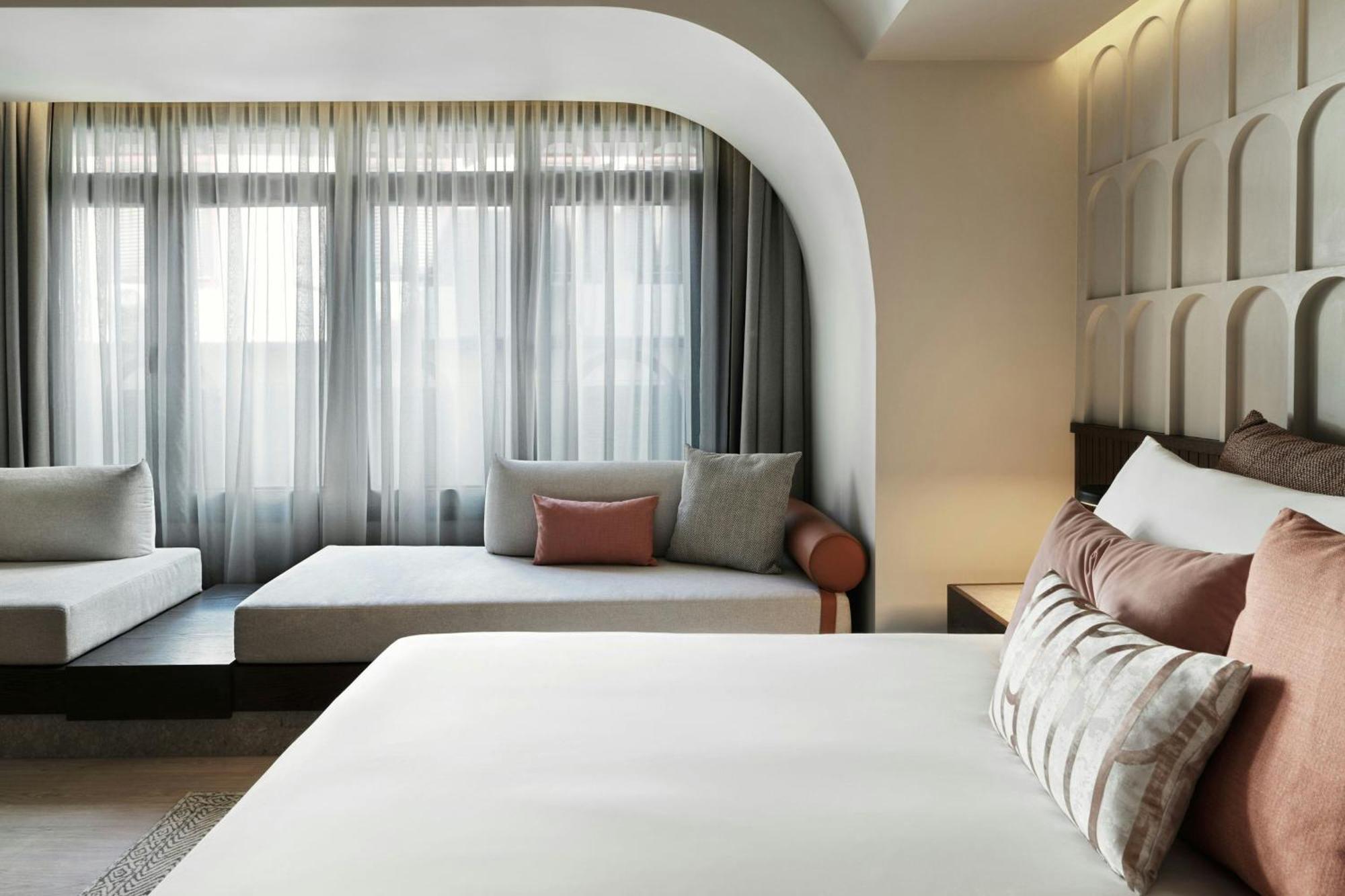 Monasty, Thessaloniki, Autograph Collection Hotel Kültér fotó A bedroom at the hotel